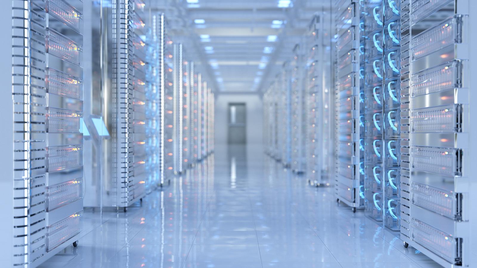 Bright data centre / server room with computers and lights.